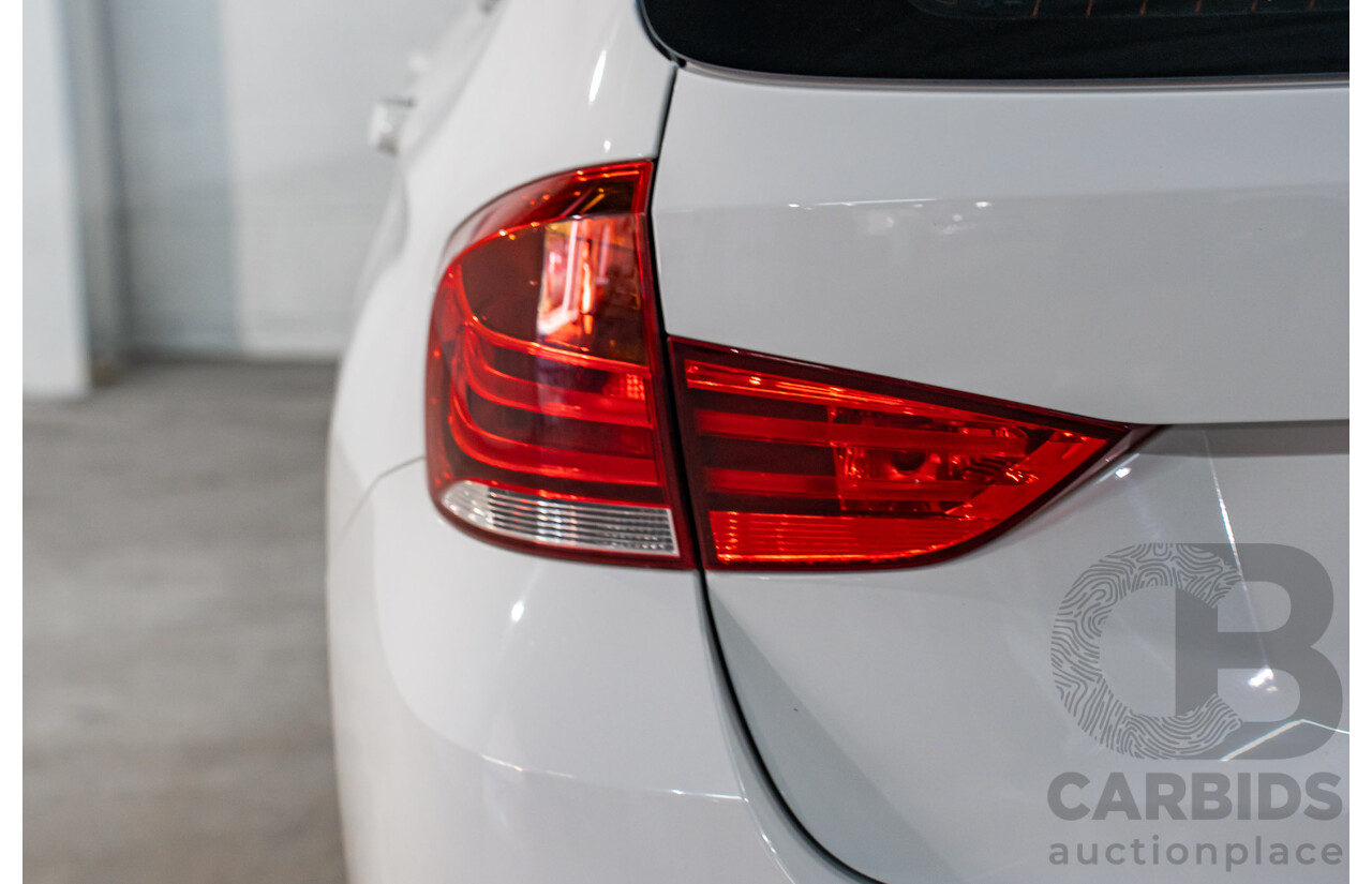 11/2013 BMW X1 sDrive 18d E84 MY13 4d Wagon Alpine White Turbo Diesel 2.0L