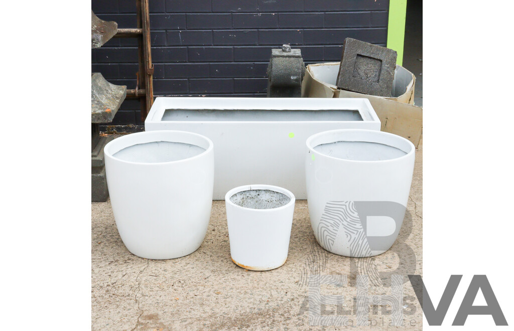 Collection of Four Plastic Planters