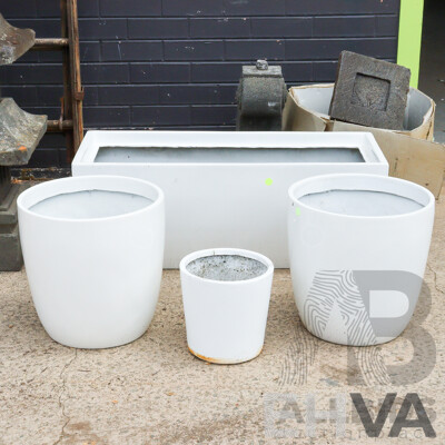 Collection of Four Plastic Planters