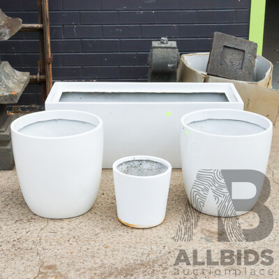 Collection of Four Plastic Planters