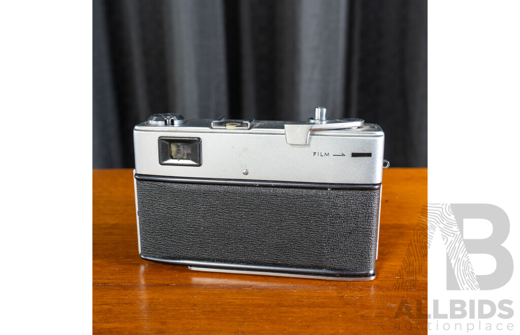 Vintage Minolta Hi-Matic 7s 35mm Film Rangefinder Camera with Rokkor-PF 45mm f/1.8 Lens