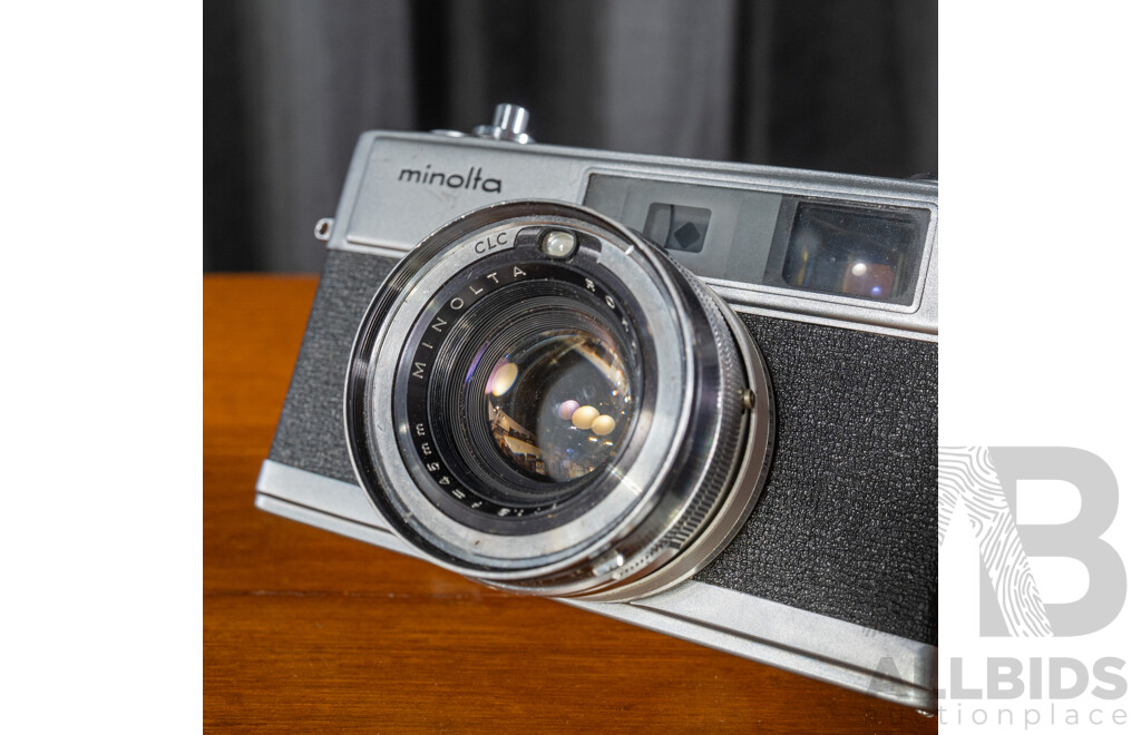 Vintage Minolta Hi-Matic 7s 35mm Film Rangefinder Camera with Rokkor-PF 45mm f/1.8 Lens