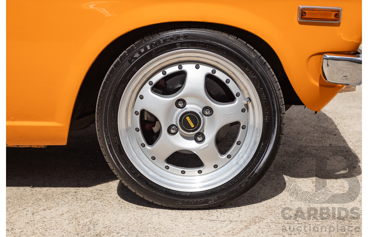 6/1971 Datsun 1200 Deluxe 2d Coupe Orange Turbo 1.8L - Modified & Engineered