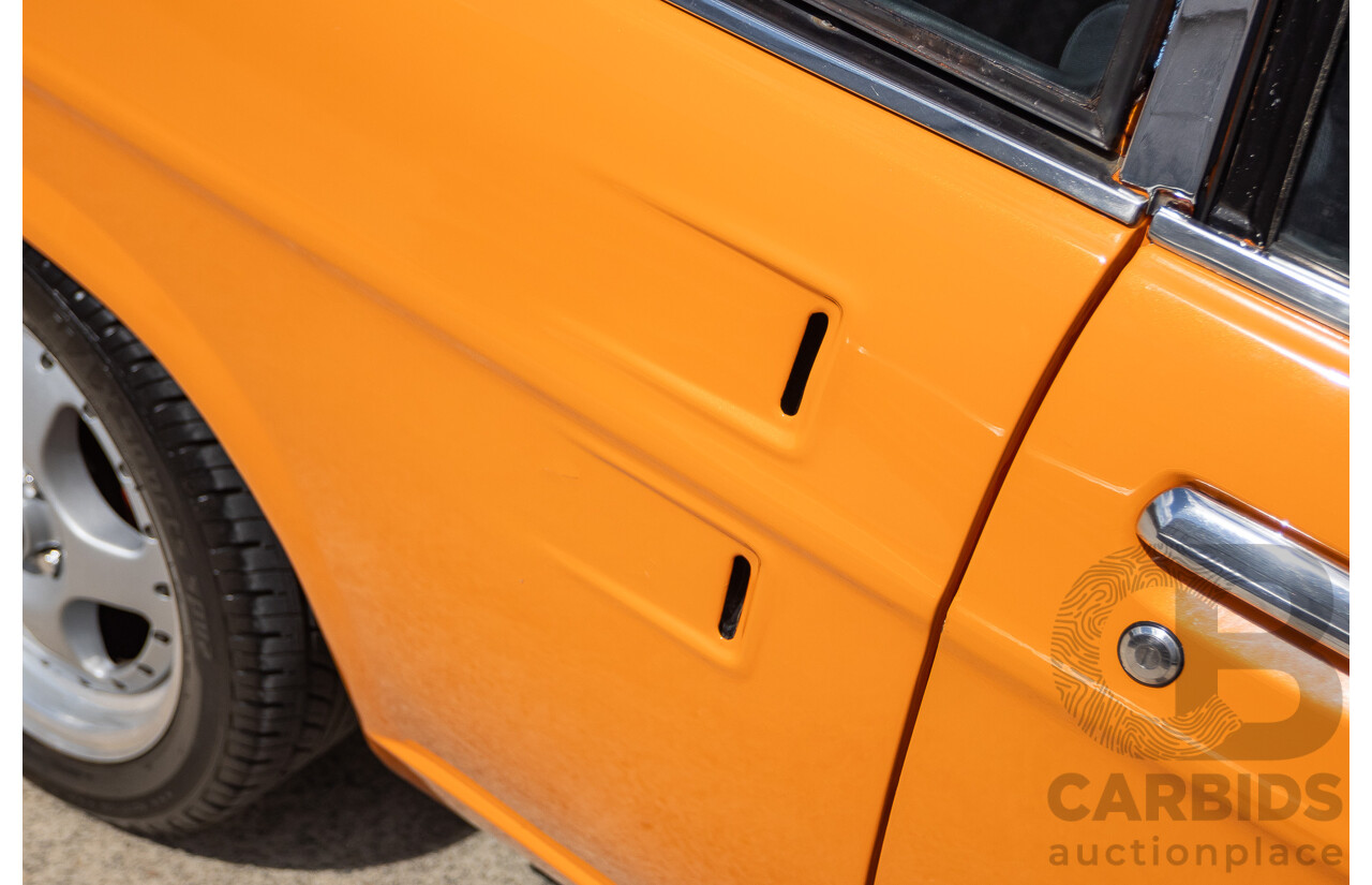 6/1971 Datsun 1200 Deluxe 2d Coupe Orange Turbo 1.8L - Modified & Engineered