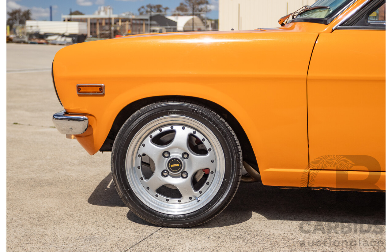 6/1971 Datsun 1200 Deluxe 2d Coupe Orange Turbo 1.8L - Modified & Engineered
