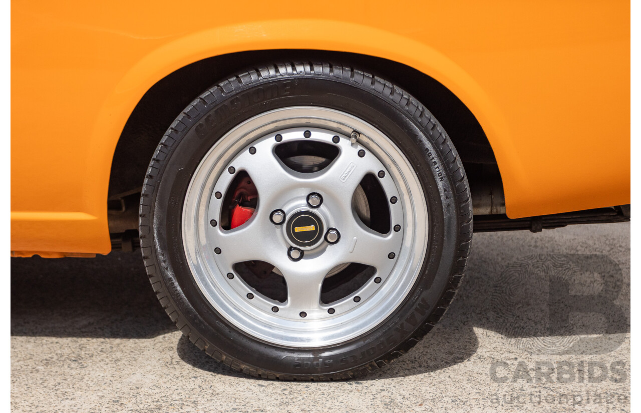 6/1971 Datsun 1200 Deluxe 2d Coupe Orange Turbo 1.8L - Modified & Engineered