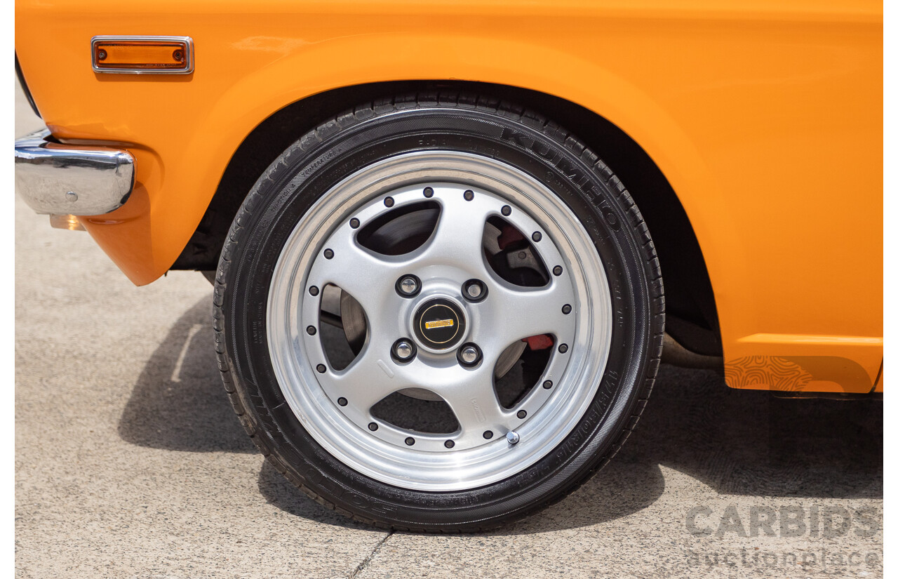 6/1971 Datsun 1200 Deluxe 2d Coupe Orange Turbo 1.8L - Modified & Engineered