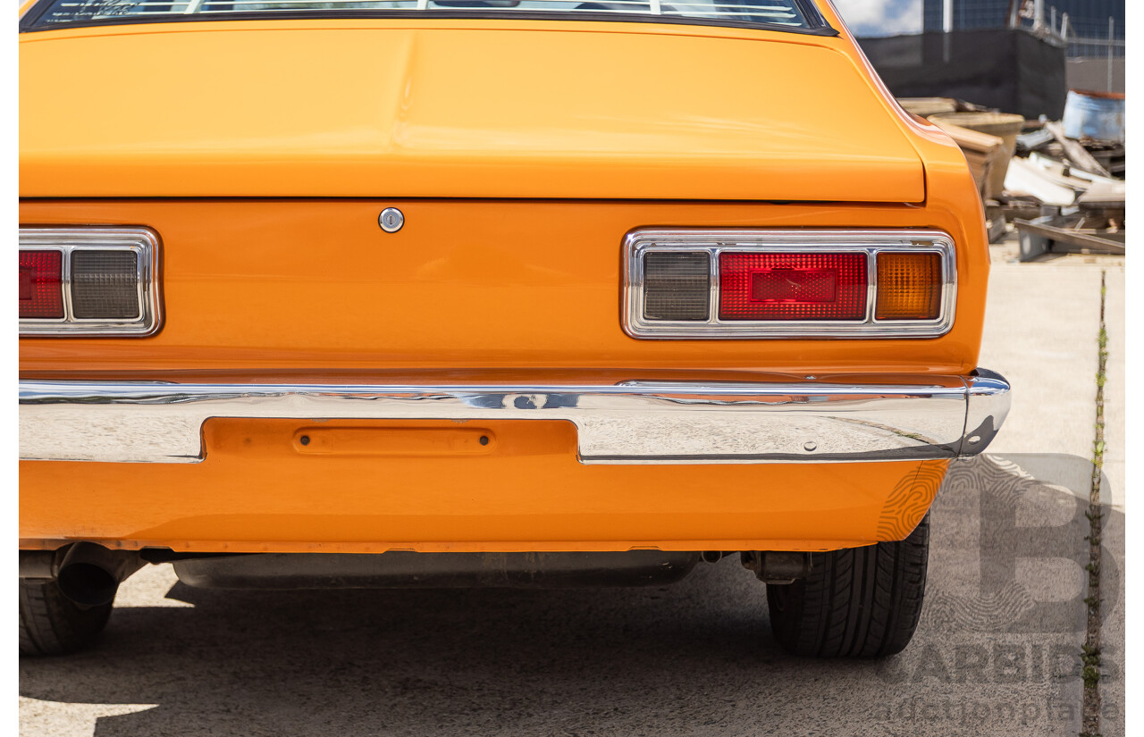 6/1971 Datsun 1200 Deluxe 2d Coupe Orange Turbo 1.8L - Modified & Engineered
