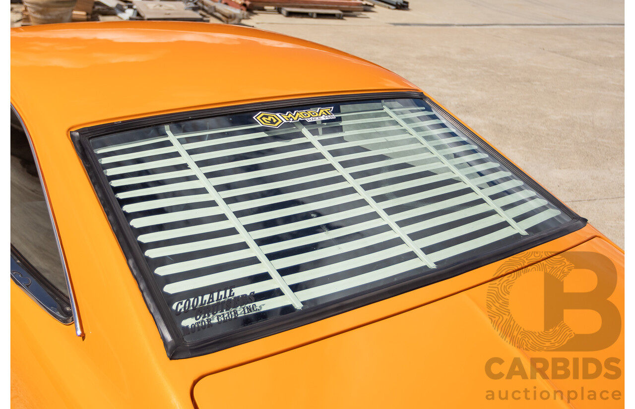 6/1971 Datsun 1200 Deluxe 2d Coupe Orange Turbo 1.8L - Modified & Engineered