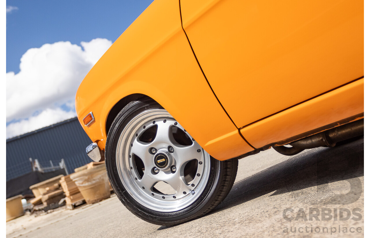 6/1971 Datsun 1200 Deluxe 2d Coupe Orange Turbo 1.8L - Modified & Engineered
