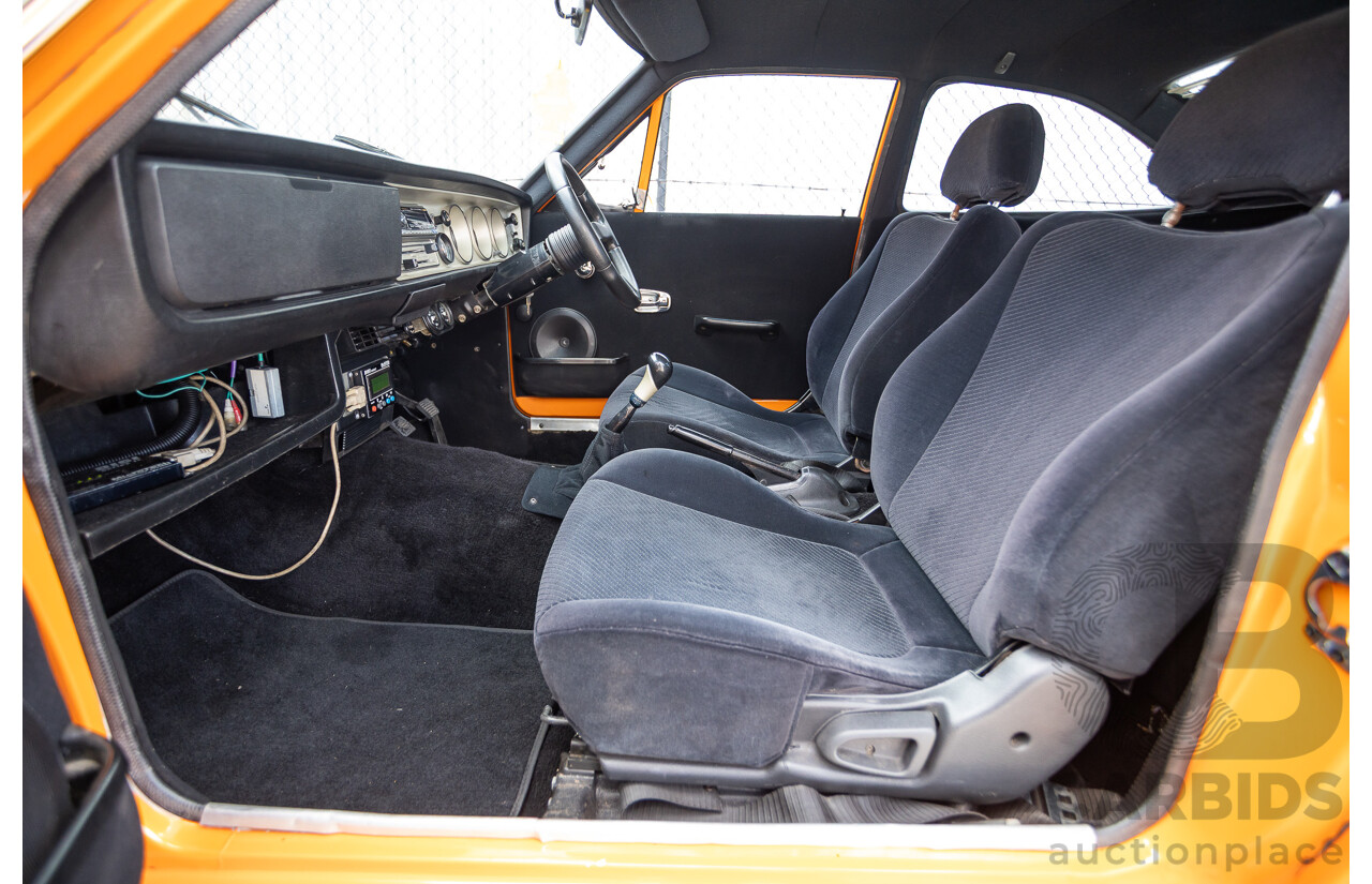 6/1971 Datsun 1200 Deluxe 2d Coupe Orange Turbo 1.8L - Modified & Engineered