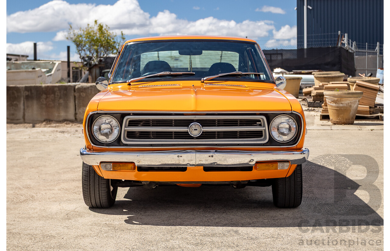 6/1971 Datsun 1200 Deluxe 2d Coupe Orange Turbo 1.8L - Modified & Engineered
