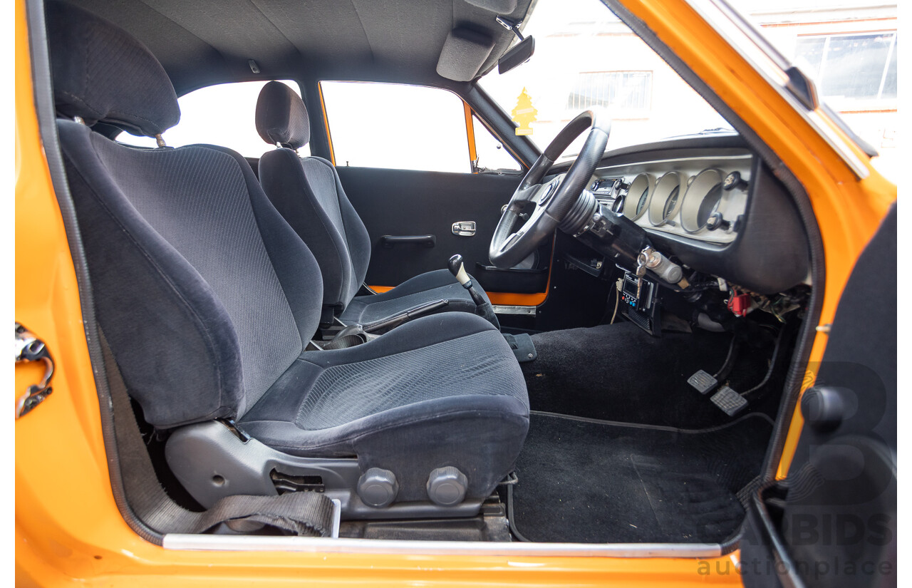 6/1971 Datsun 1200 Deluxe 2d Coupe Orange Turbo 1.8L - Modified & Engineered