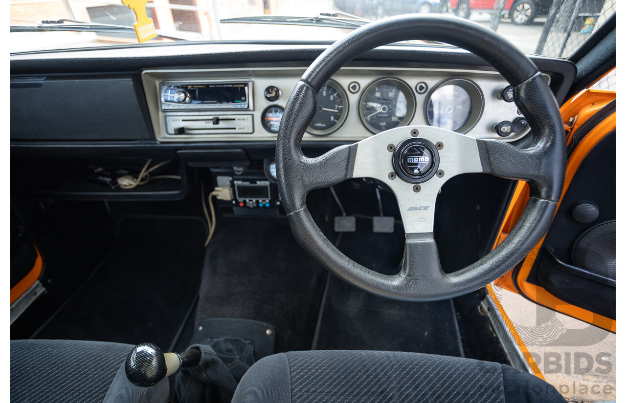 6/1971 Datsun 1200 Deluxe 2d Coupe Orange Turbo 1.8L - Modified & Engineered