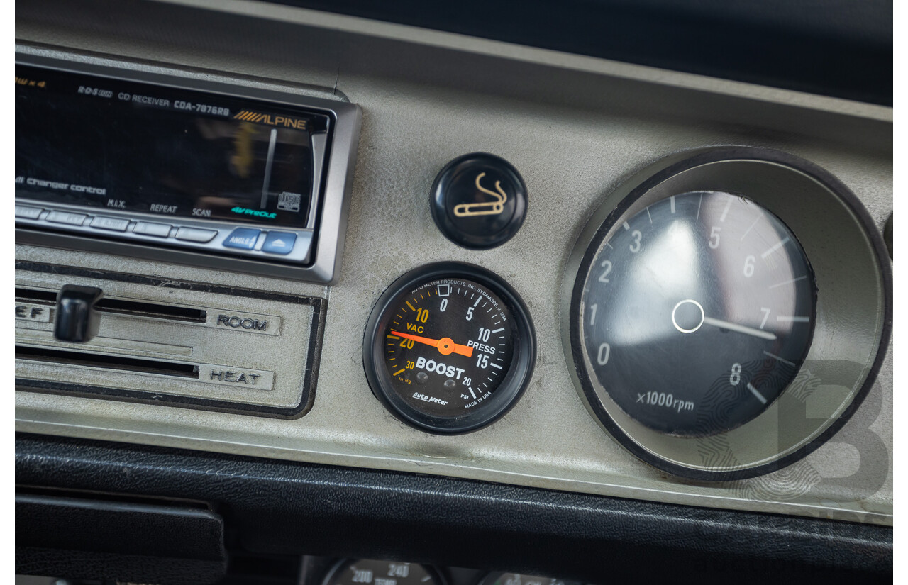 6/1971 Datsun 1200 Deluxe 2d Coupe Orange Turbo 1.8L - Modified & Engineered