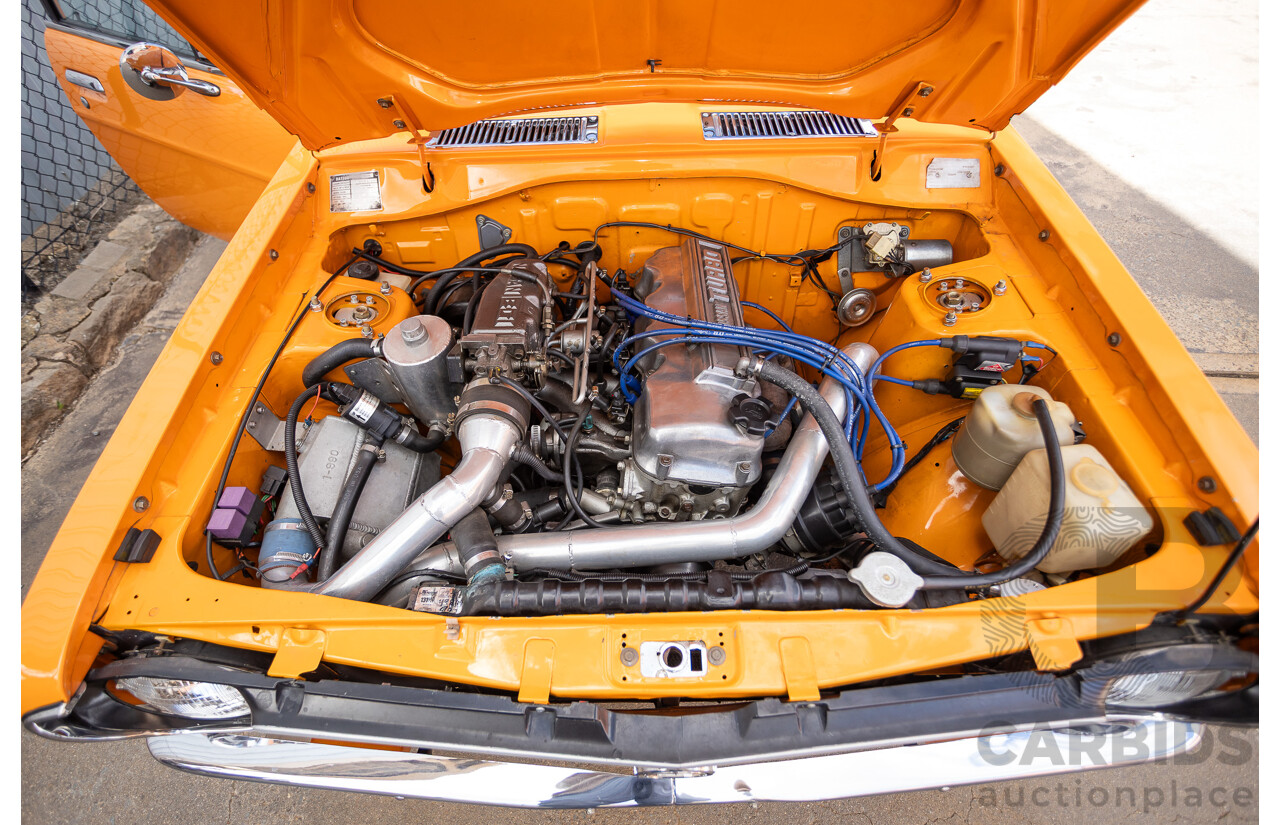 6/1971 Datsun 1200 Deluxe 2d Coupe Orange Turbo 1.8L - Modified & Engineered