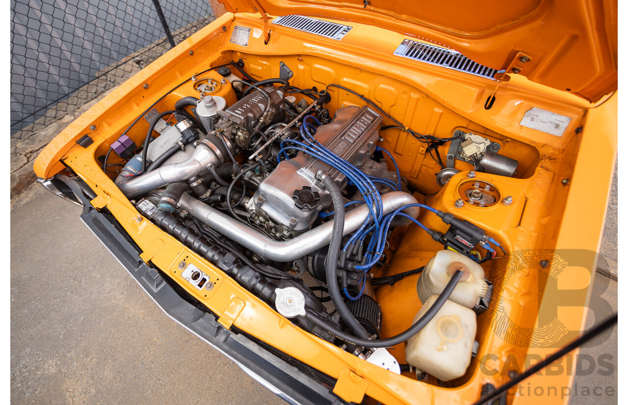 6/1971 Datsun 1200 Deluxe 2d Coupe Orange Turbo 1.8L - Modified & Engineered