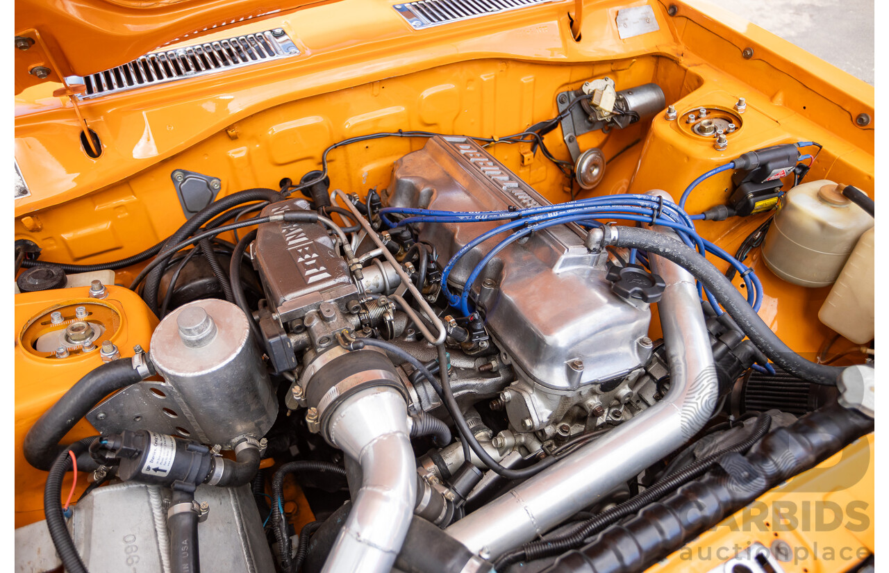 6/1971 Datsun 1200 Deluxe 2d Coupe Orange Turbo 1.8L - Modified & Engineered