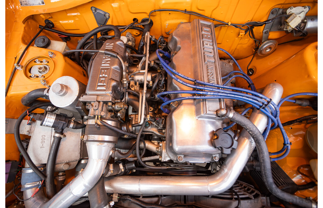 6/1971 Datsun 1200 Deluxe 2d Coupe Orange Turbo 1.8L - Modified & Engineered