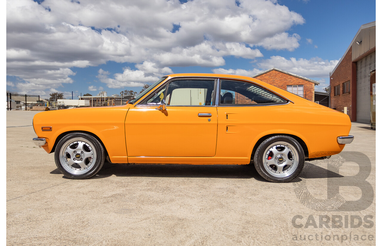 6/1971 Datsun 1200 Deluxe 2d Coupe Orange Turbo 1.8L - Modified & Engineered