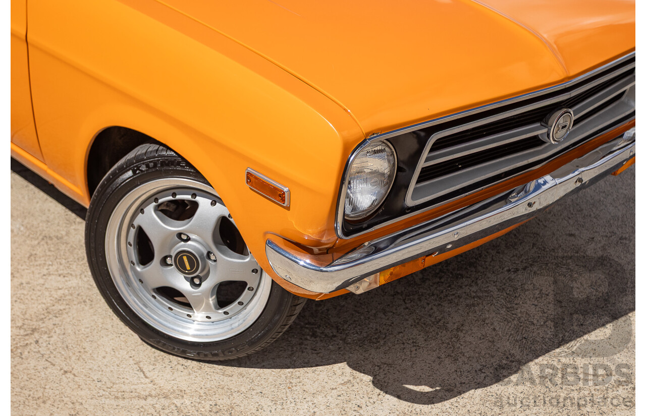 6/1971 Datsun 1200 Deluxe 2d Coupe Orange Turbo 1.8L - Modified & Engineered