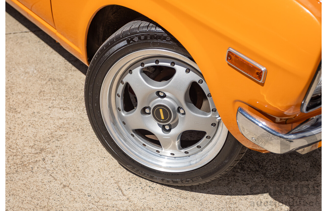 6/1971 Datsun 1200 Deluxe 2d Coupe Orange Turbo 1.8L - Modified & Engineered