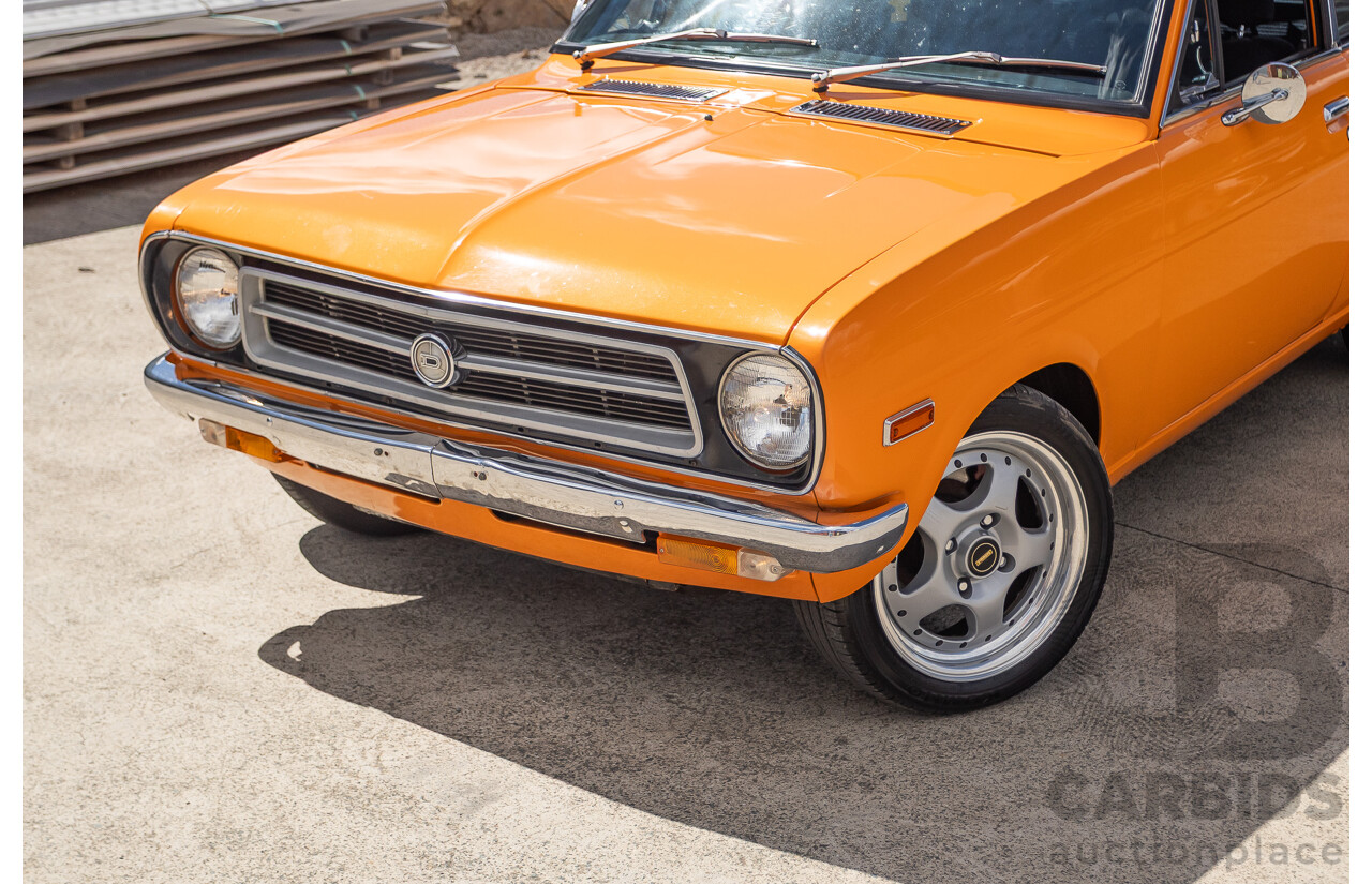 6/1971 Datsun 1200 Deluxe 2d Coupe Orange Turbo 1.8L - Modified & Engineered