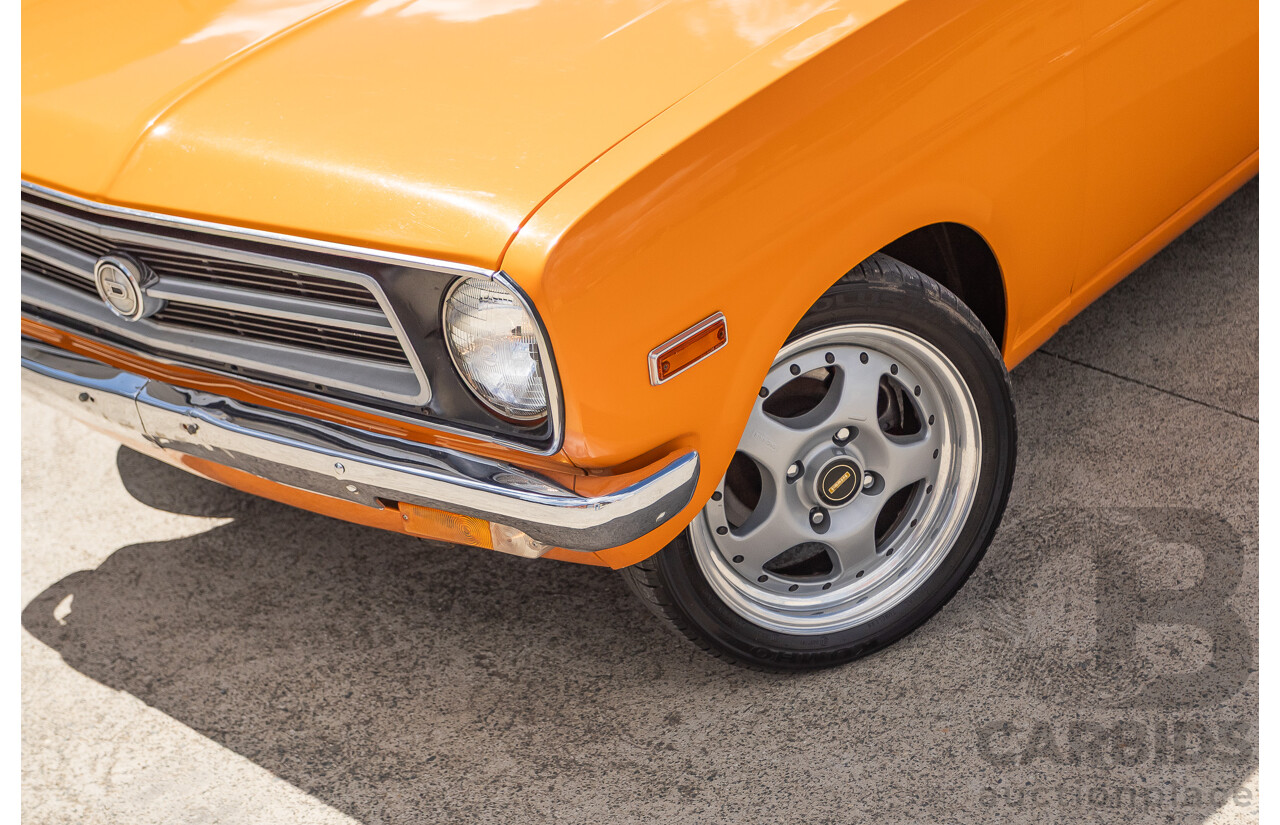 6/1971 Datsun 1200 Deluxe 2d Coupe Orange Turbo 1.8L - Modified & Engineered