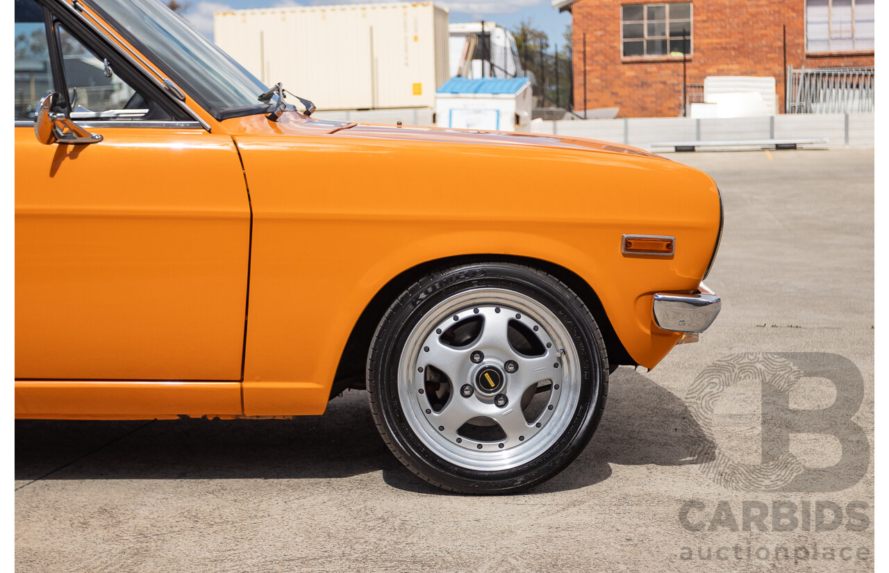 6/1971 Datsun 1200 Deluxe 2d Coupe Orange Turbo 1.8L - Modified & Engineered