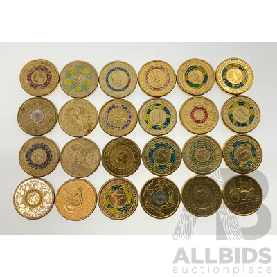 Twenty Four Australian Commemorative Two Dollar Coins Including 2022 Front Line Workers, 2022 A,U,S, 2018 INVICTUS, 2012 Remembrance, 2020 Women's T20, 2020 Paralympics and Olympics, 2021 Dorothy Dinosaur,