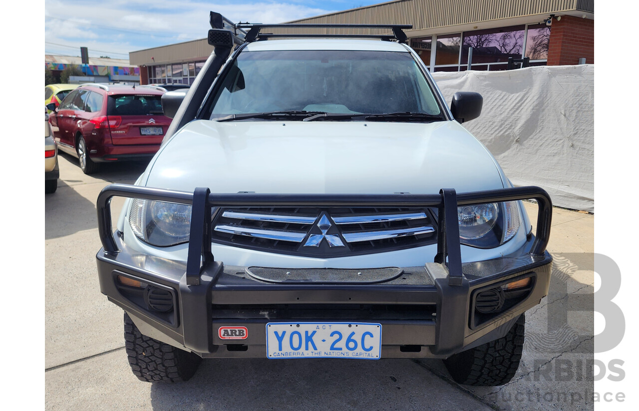 10/2014 Mitsubishi Triton GLX (4x4) MN MY15 Double Cab Utility White 2.5L