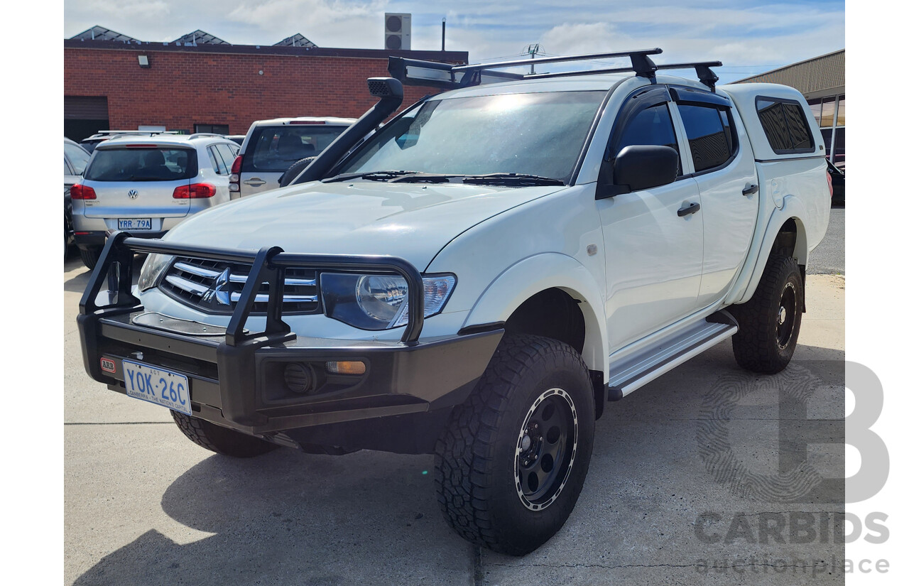 10/2014 Mitsubishi Triton GLX (4x4) MN MY15 Double Cab Utility White 2.5L