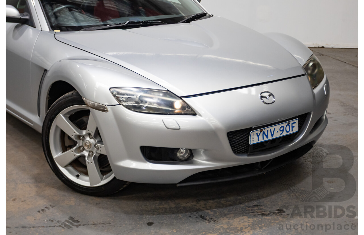9/2005 Mazda RX-8 FE Series 1 4d Coupe Sunlight Silver Metallic 1.3L