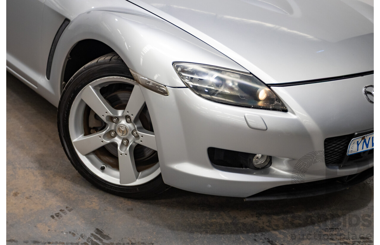 9/2005 Mazda RX-8 FE Series 1 4d Coupe Sunlight Silver Metallic 1.3L