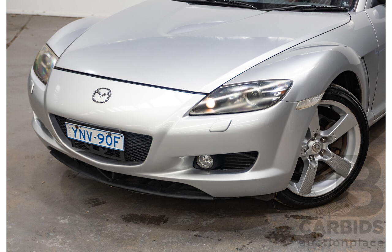9/2005 Mazda RX-8 FE Series 1 4d Coupe Sunlight Silver Metallic 1.3L