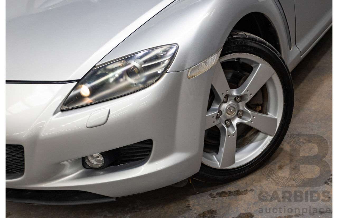 9/2005 Mazda RX-8 FE Series 1 4d Coupe Sunlight Silver Metallic 1.3L