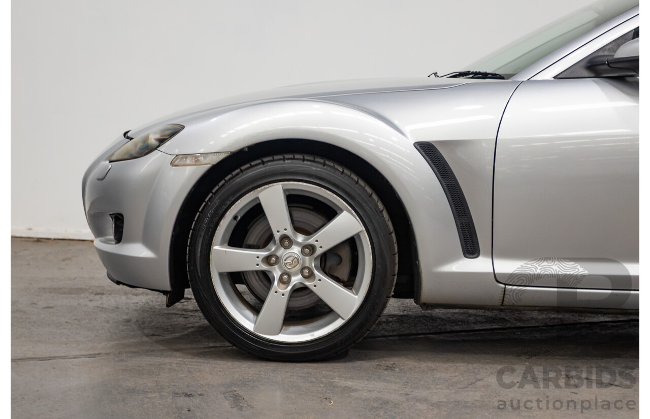 9/2005 Mazda RX-8 FE Series 1 4d Coupe Sunlight Silver Metallic 1.3L