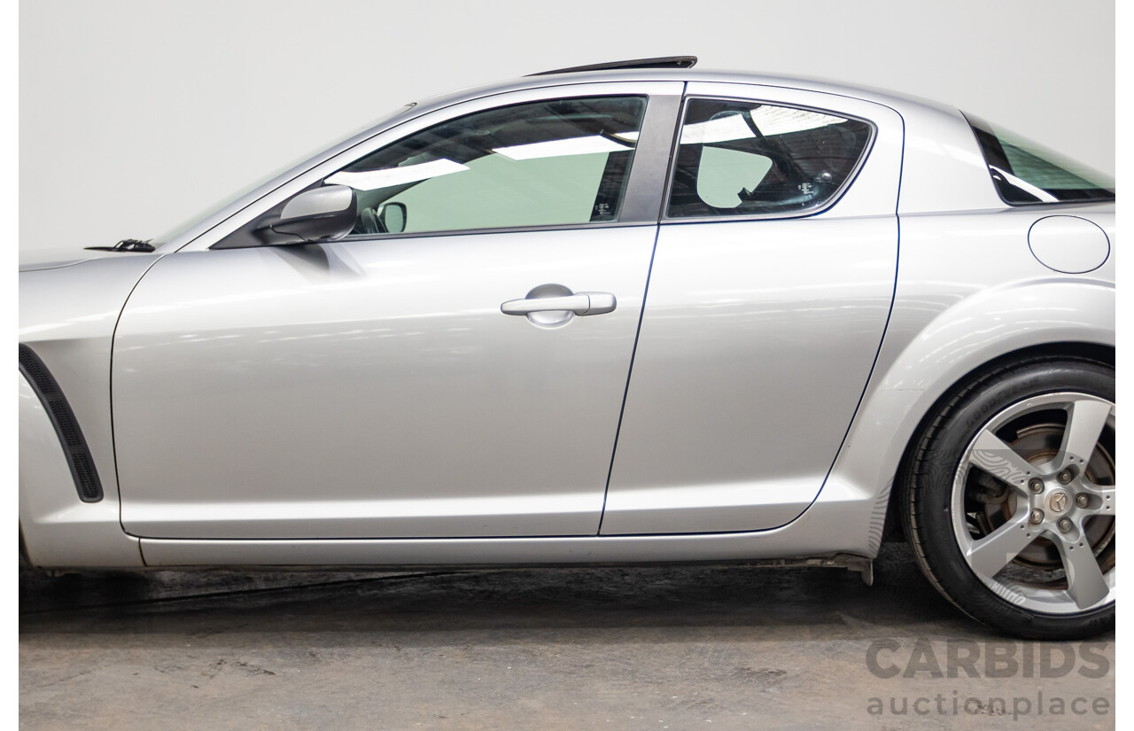 9/2005 Mazda RX-8 FE Series 1 4d Coupe Sunlight Silver Metallic 1.3L