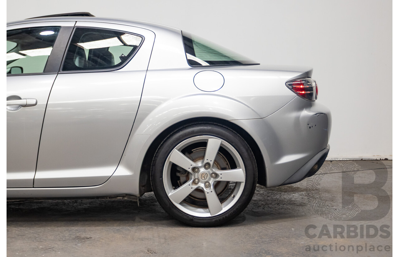 9/2005 Mazda RX-8 FE Series 1 4d Coupe Sunlight Silver Metallic 1.3L