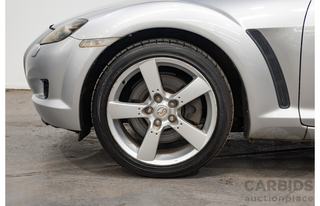 9/2005 Mazda RX-8 FE Series 1 4d Coupe Sunlight Silver Metallic 1.3L