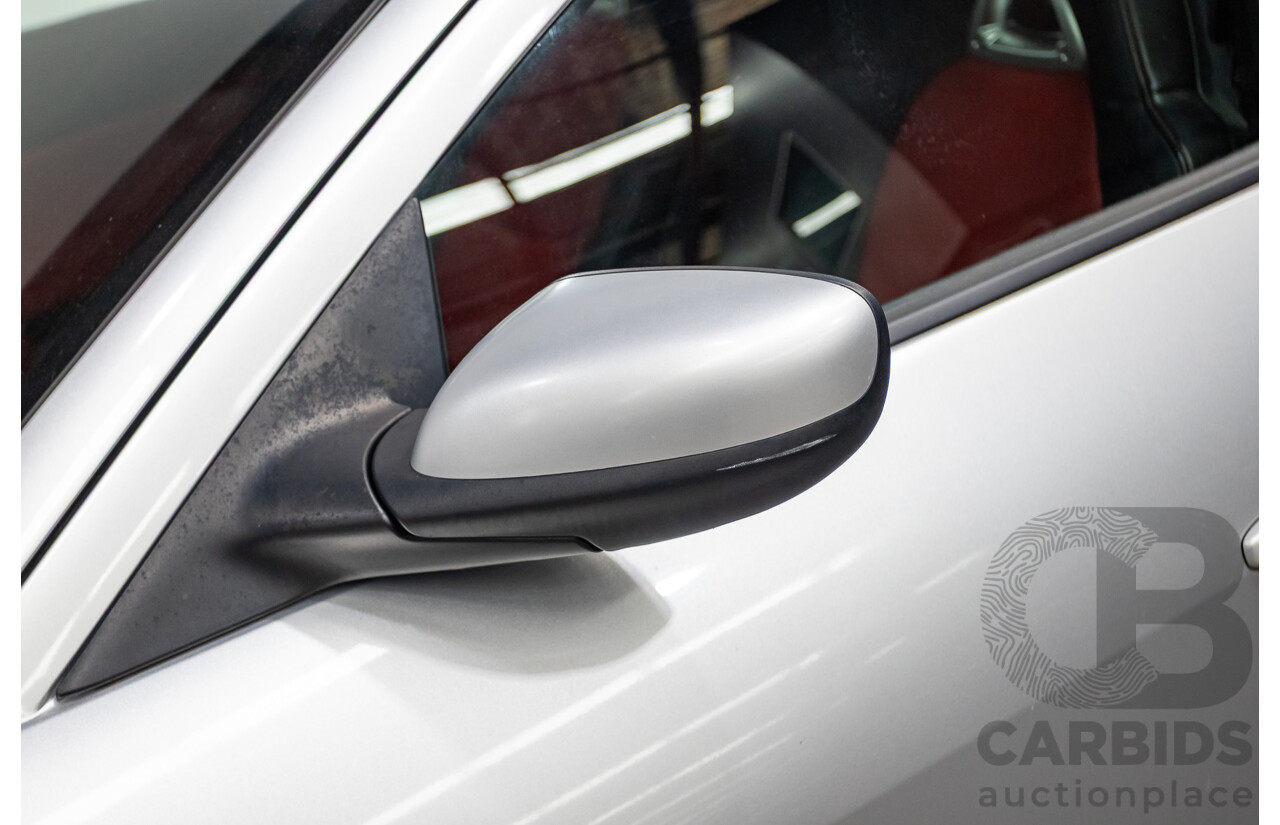 9/2005 Mazda RX-8 FE Series 1 4d Coupe Sunlight Silver Metallic 1.3L