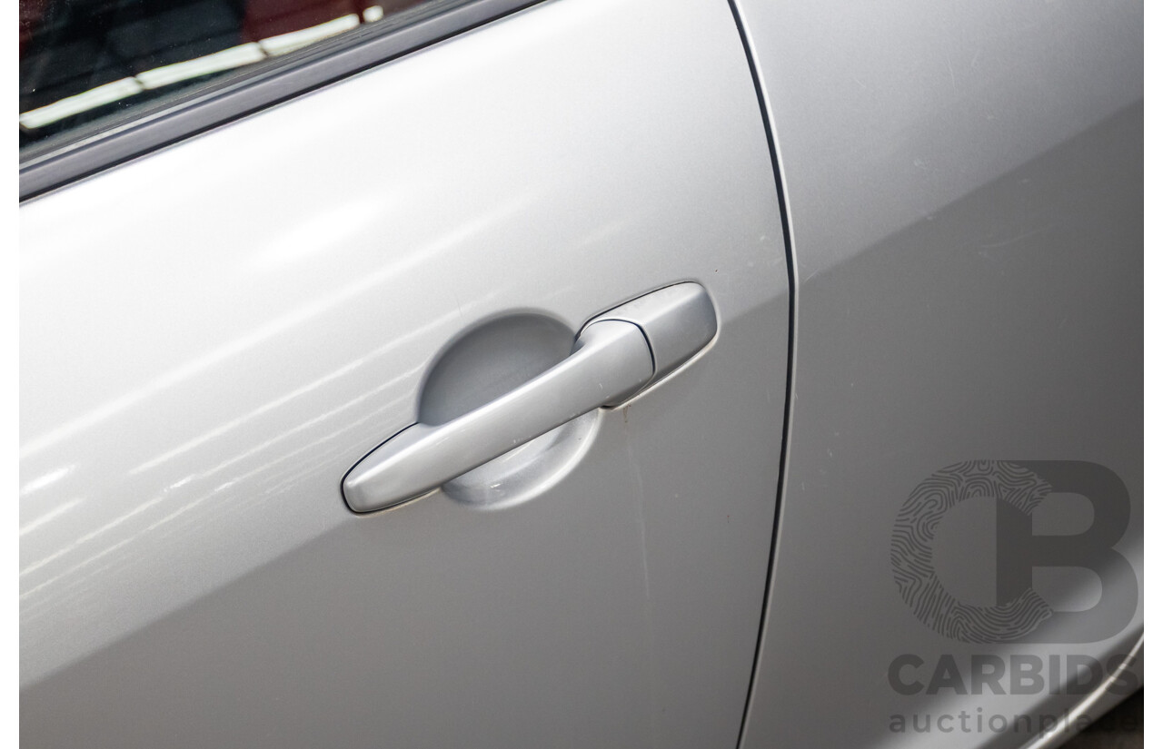 9/2005 Mazda RX-8 FE Series 1 4d Coupe Sunlight Silver Metallic 1.3L