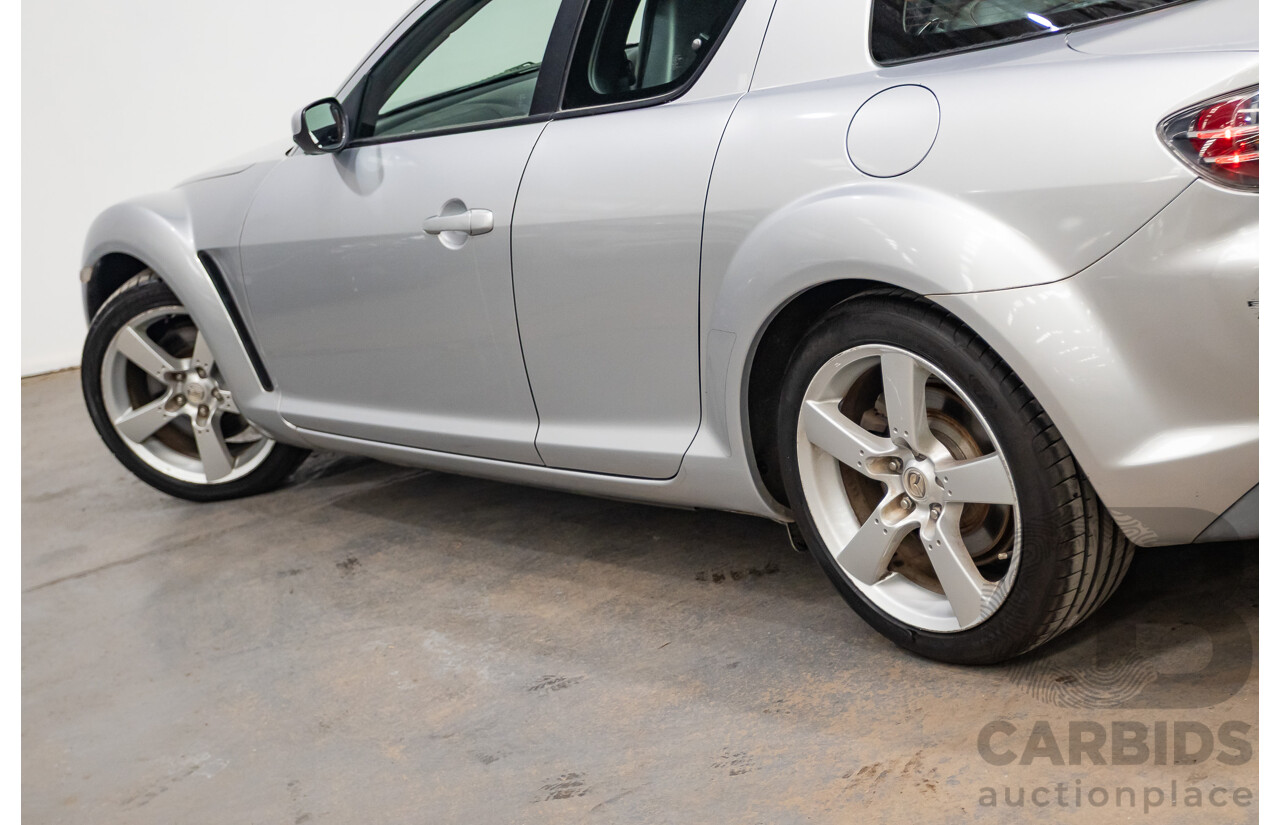 9/2005 Mazda RX-8 FE Series 1 4d Coupe Sunlight Silver Metallic 1.3L