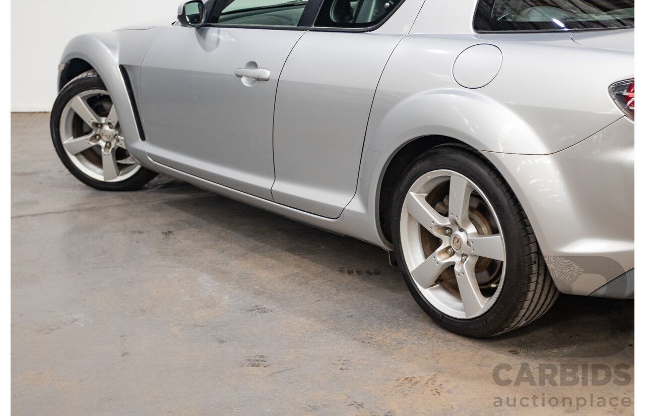 9/2005 Mazda RX-8 FE Series 1 4d Coupe Sunlight Silver Metallic 1.3L