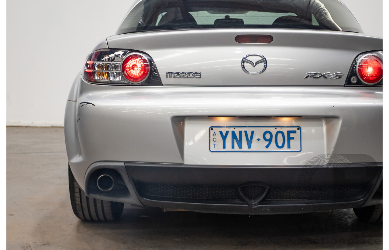 9/2005 Mazda RX-8 FE Series 1 4d Coupe Sunlight Silver Metallic 1.3L