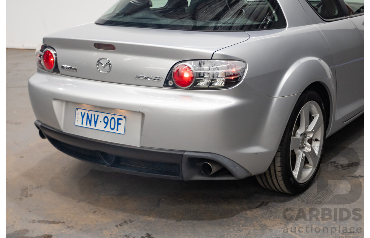 9/2005 Mazda RX-8 FE Series 1 4d Coupe Sunlight Silver Metallic 1.3L