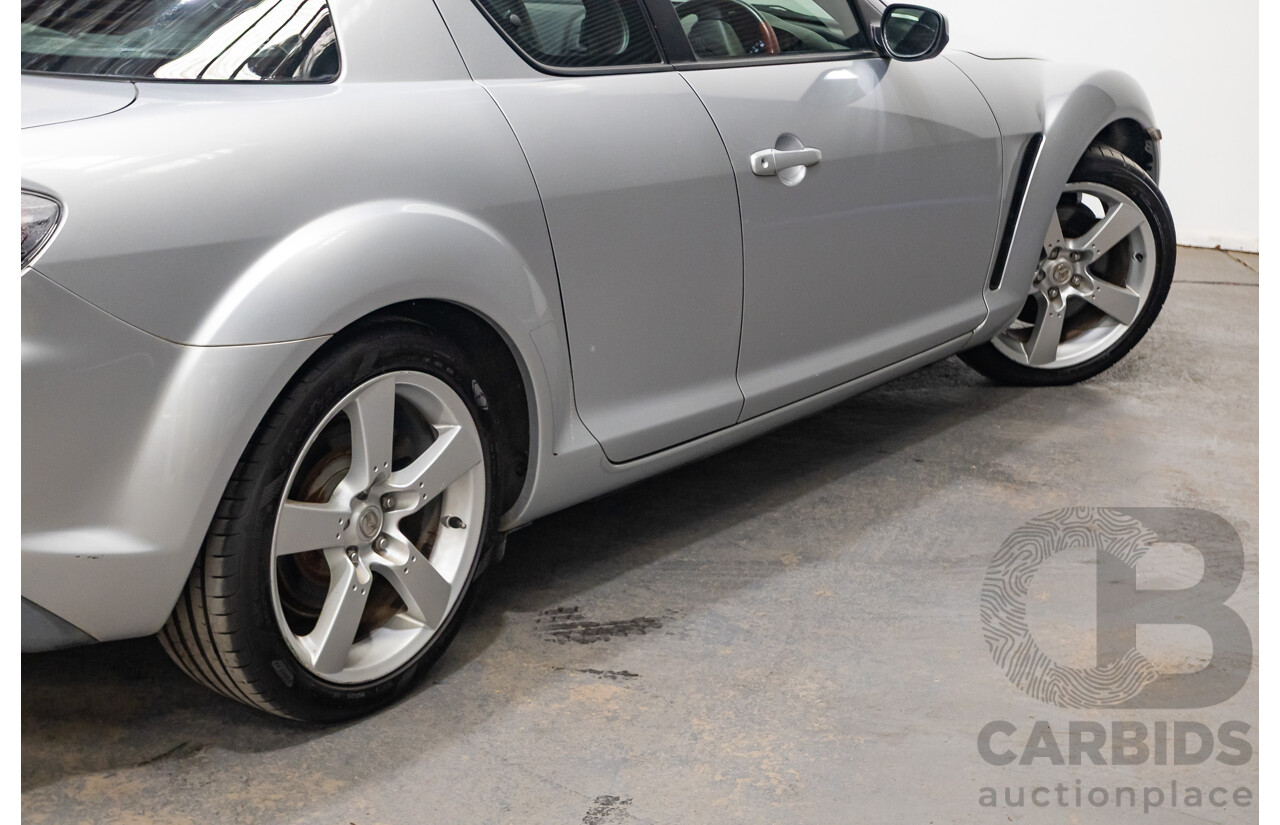 9/2005 Mazda RX-8 FE Series 1 4d Coupe Sunlight Silver Metallic 1.3L
