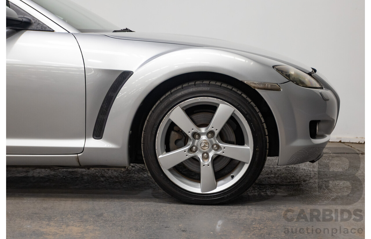 9/2005 Mazda RX-8 FE Series 1 4d Coupe Sunlight Silver Metallic 1.3L
