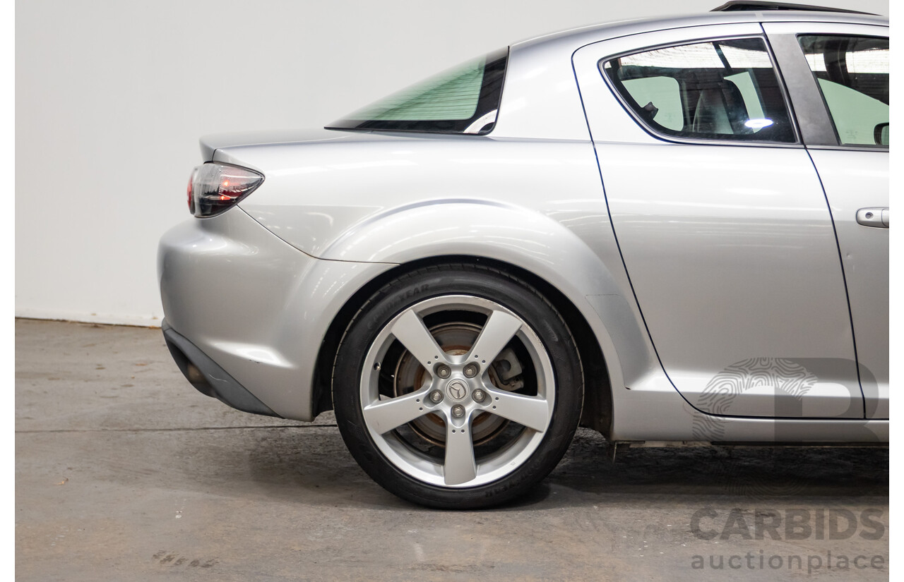9/2005 Mazda RX-8 FE Series 1 4d Coupe Sunlight Silver Metallic 1.3L