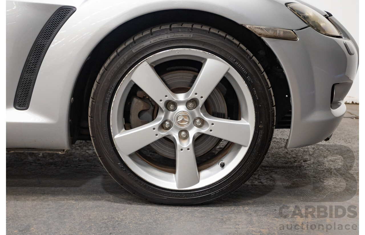 9/2005 Mazda RX-8 FE Series 1 4d Coupe Sunlight Silver Metallic 1.3L
